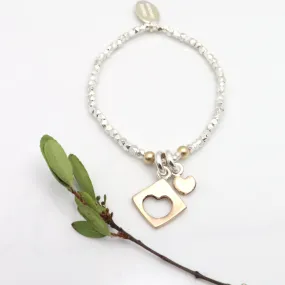 HEART COLLECTION:  Cutout Heart & Petite Heart Bracelet